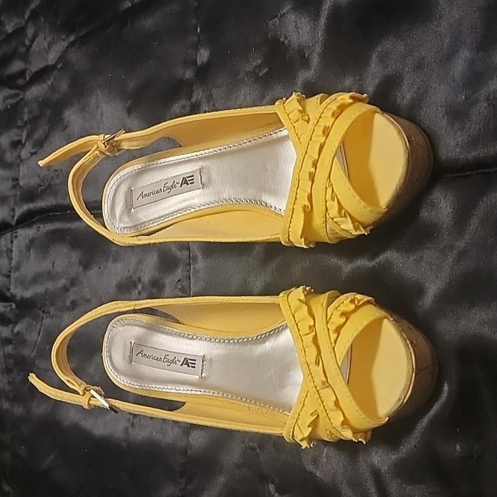American Eagle yellow wedge heeled shoe
